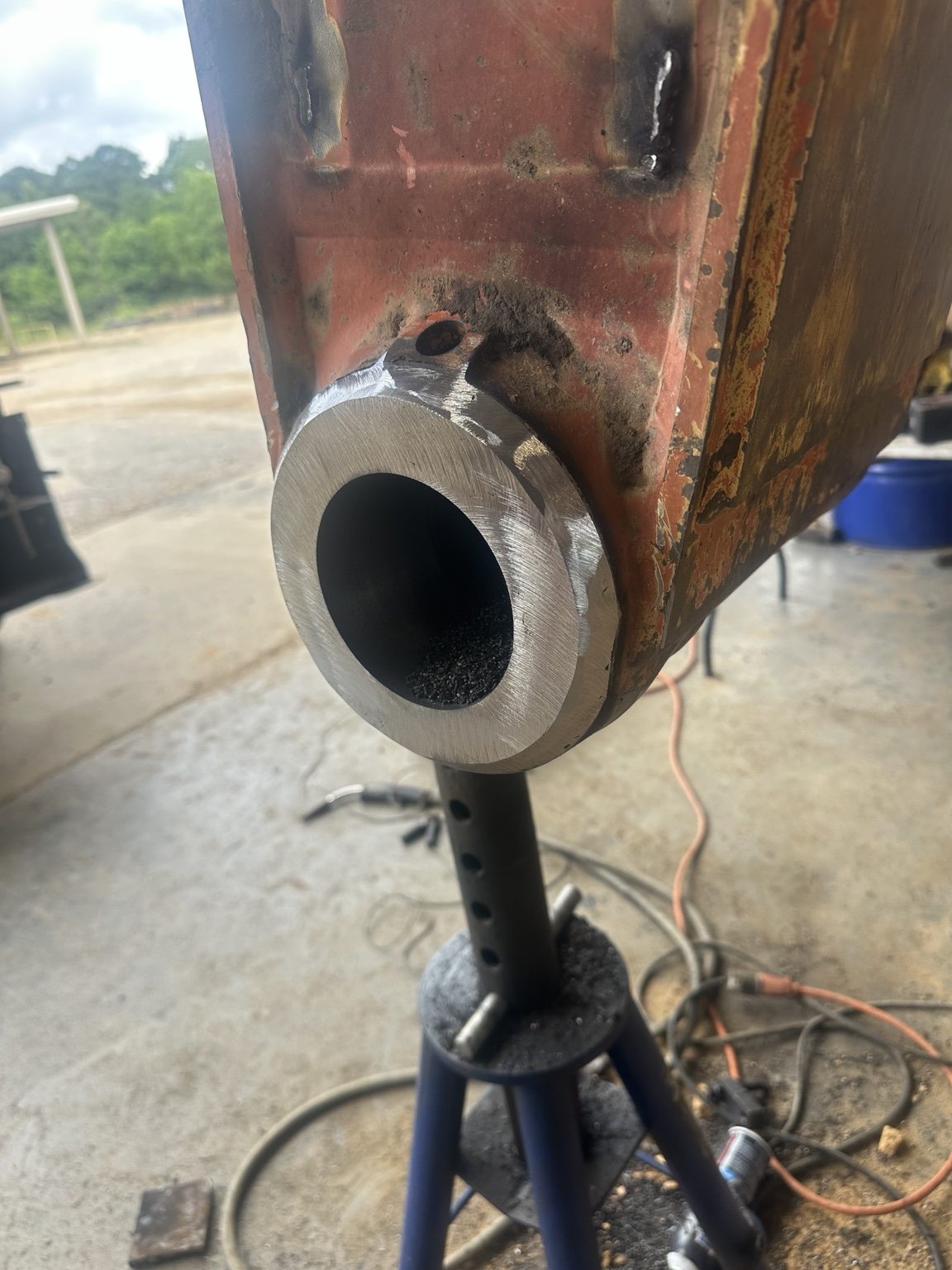 Machined bore and welded repair on heavy equipment